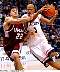 viggiano_tries_to_keep_up_with_villanueva20031230.jpg